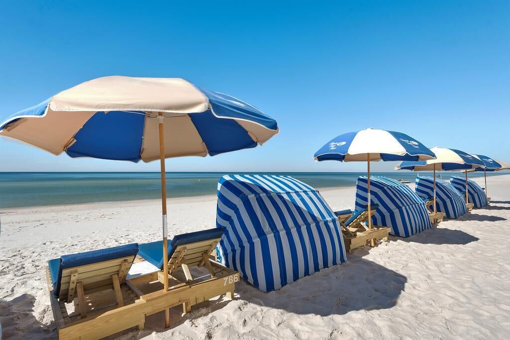 On the beach, sun-loungers