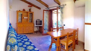 Apartment, 1 Bedroom | Living area - Porto San Paolo Villino I (Loiri Porto San Paolo)