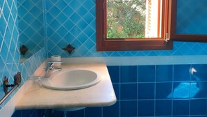 Apartment, 1 Bedroom | Bathroom sink - Porto San Paolo Villino I (Loiri Porto San Paolo)