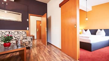 Panoramic Suite | 1 bedroom, down comforters, in-room safe, desk
