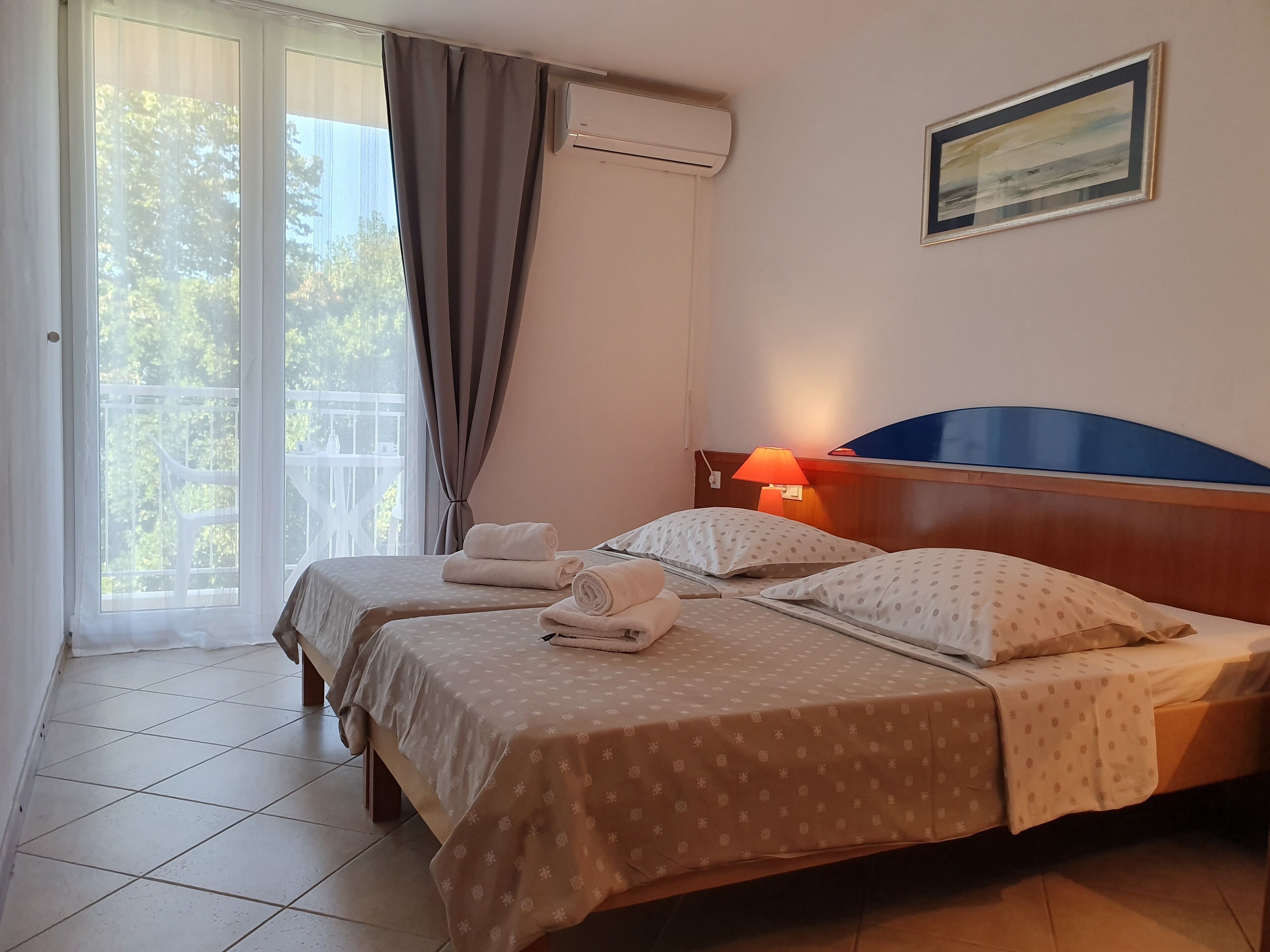 Comfort Double Room, 1 Bedroom, Balcony, Sea View | Iron/ironing board, cots/infant beds, WiFi, bed sheets