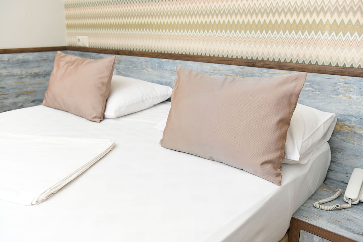 Standard Double Room, Balcony | Living area | Flat-screen TV