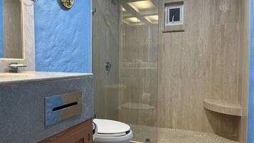 Combined shower/tub, hair dryer, towels, soap