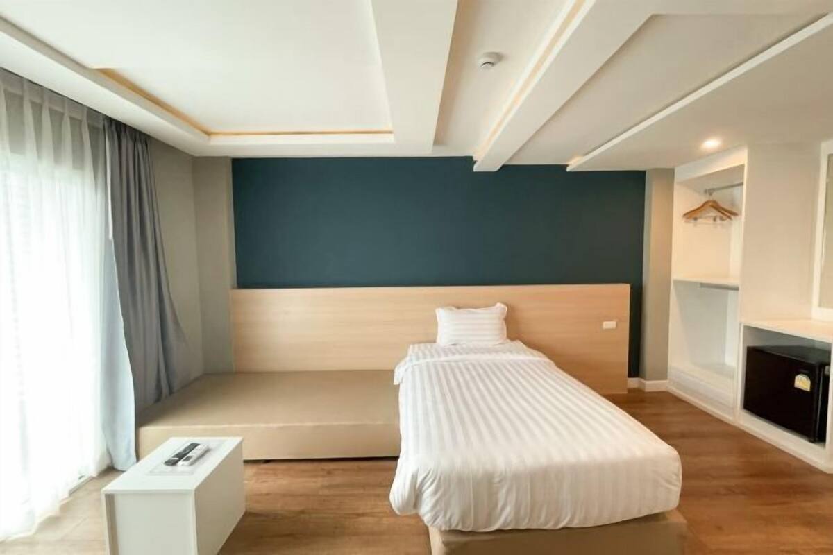 Premium bedding, blackout drapes, soundproofing, WiFi (free)