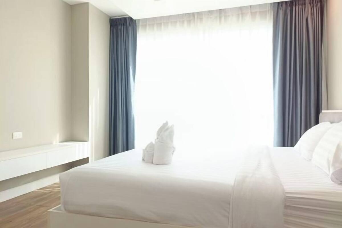 Premium bedding, blackout drapes, soundproofing, WiFi (free)