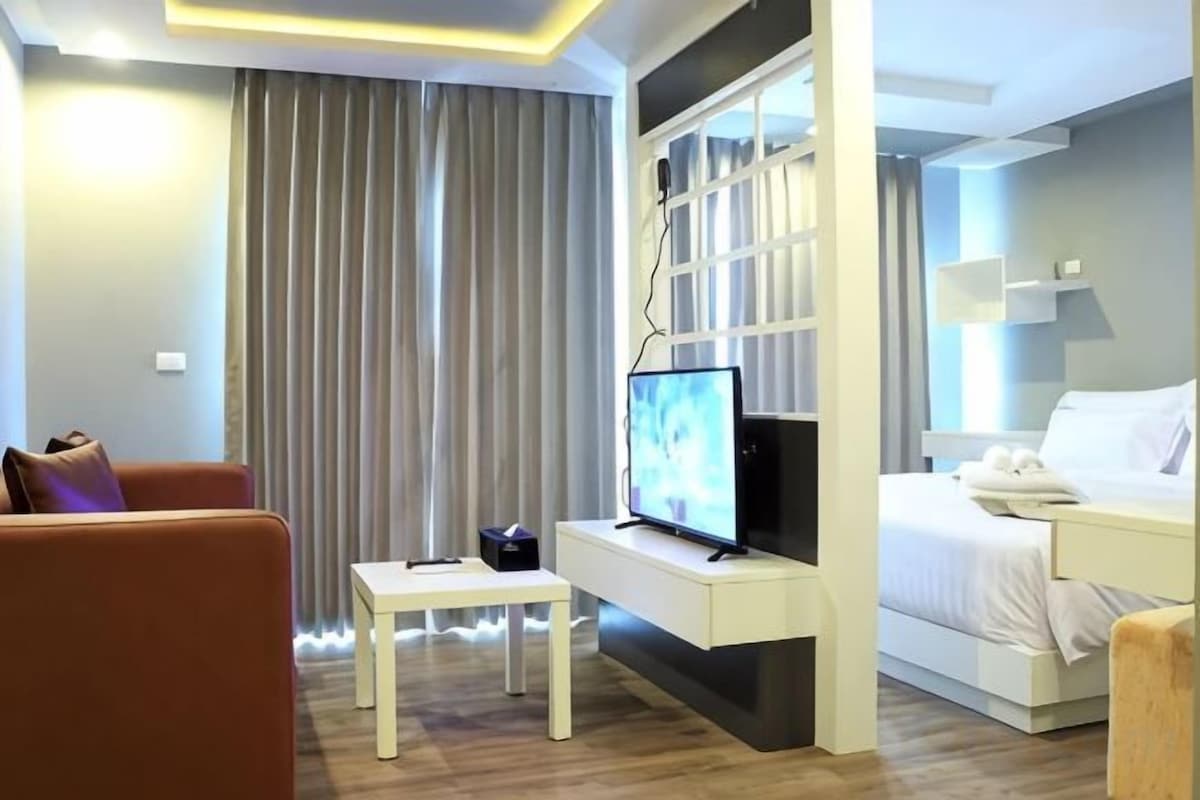 Premium bedding, blackout drapes, soundproofing, WiFi (free)