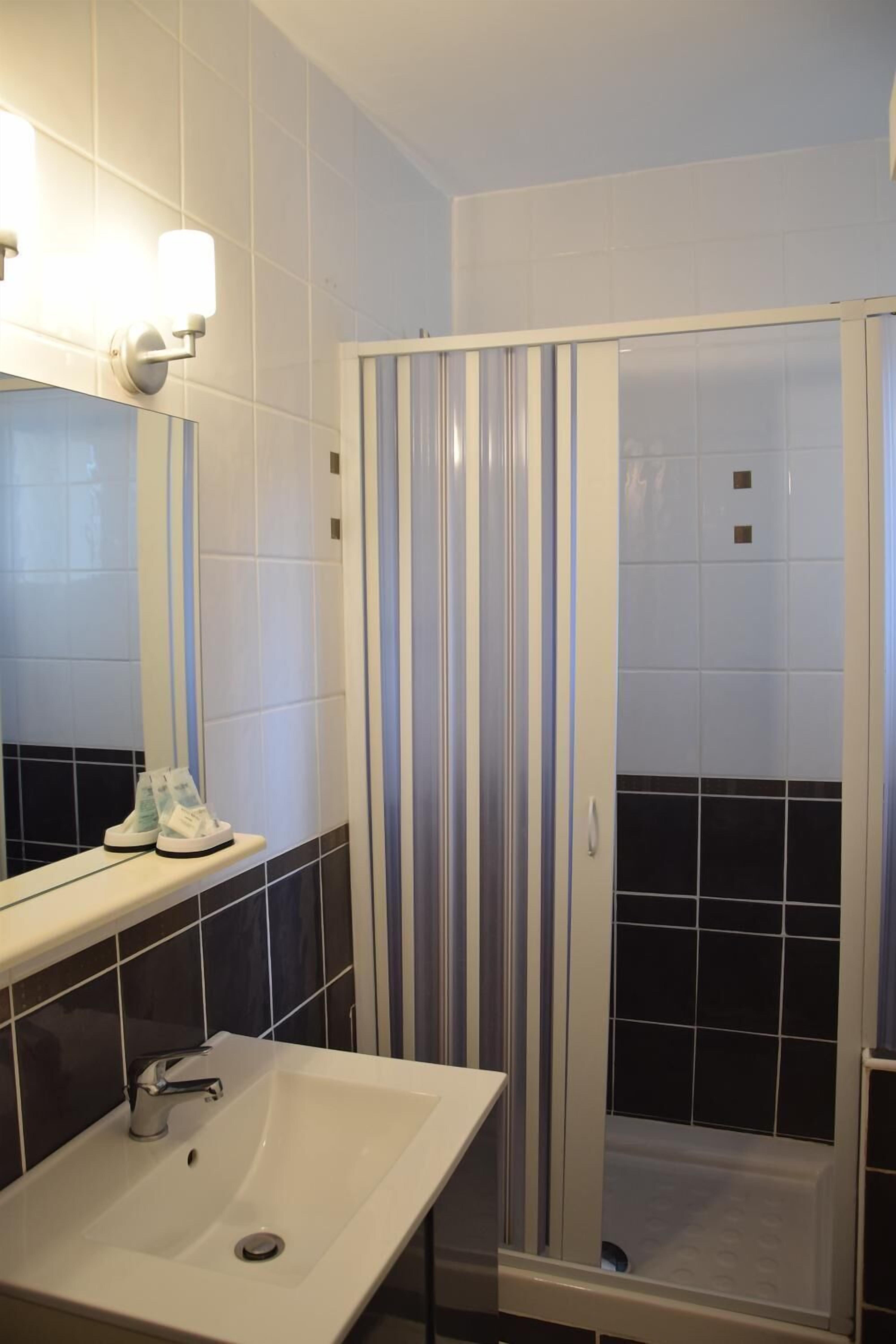 shower, rainfall showerhead, towels