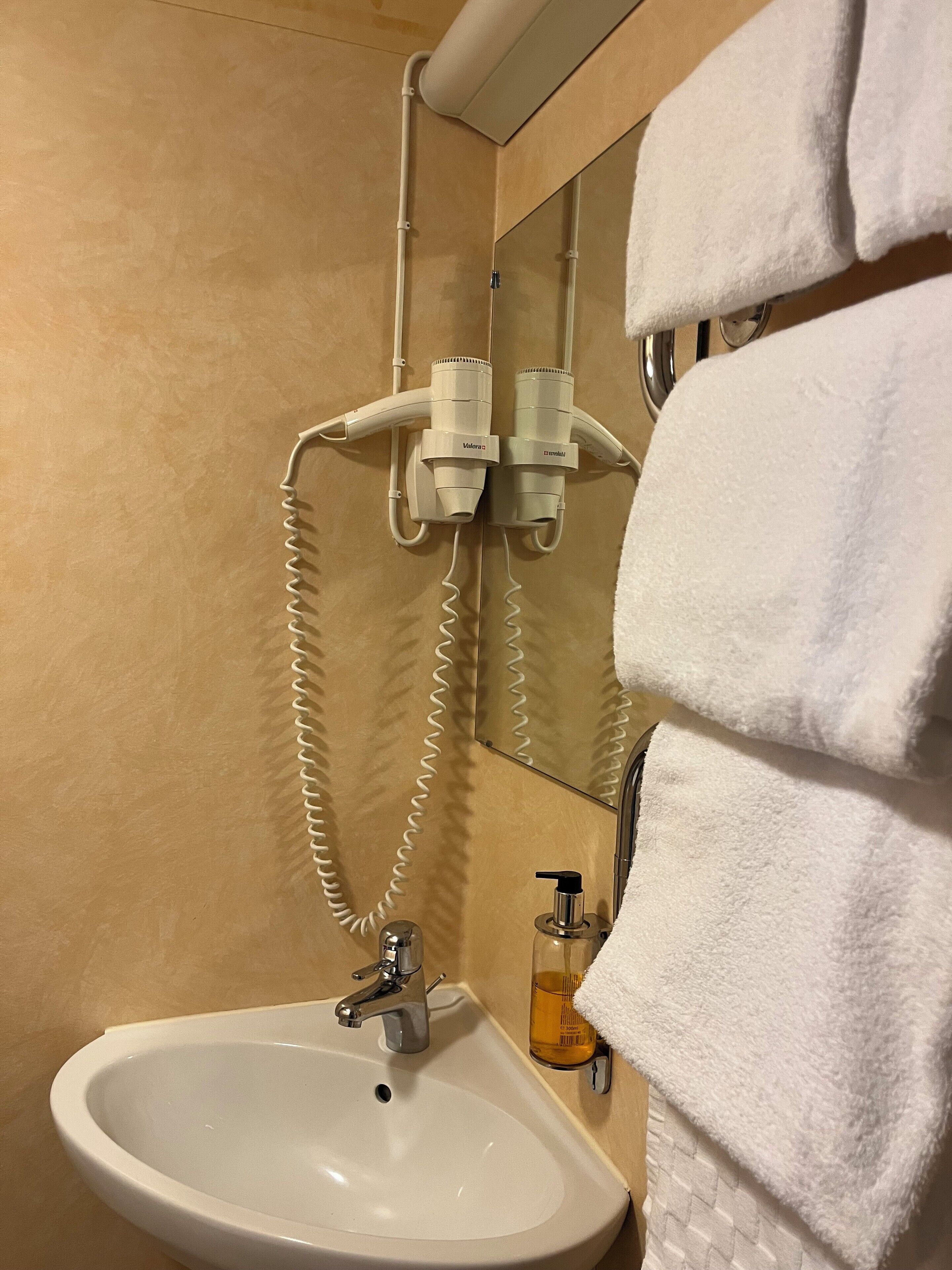 shower, free toiletries, hair dryer, slippers