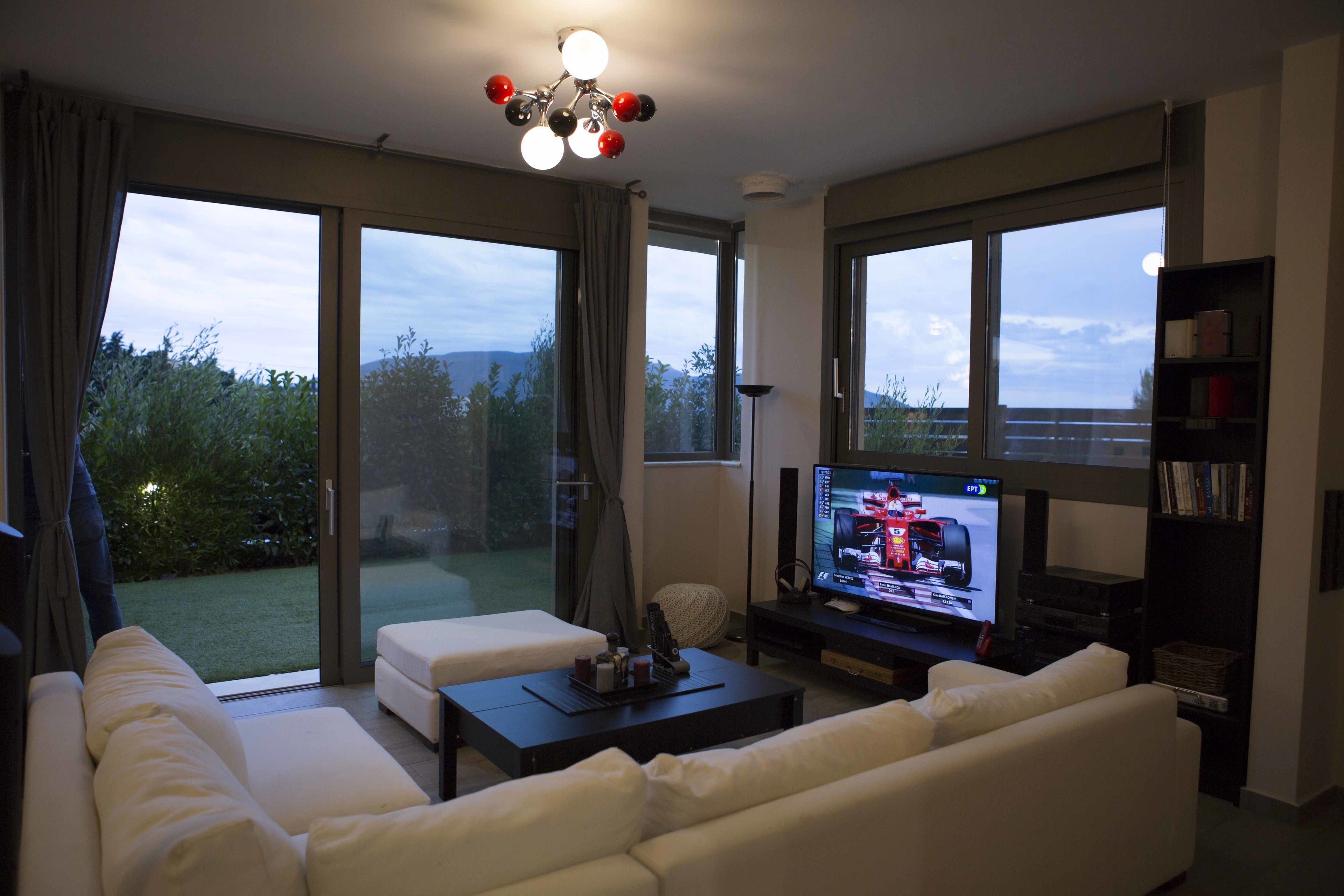 luxury house, 2 bedrooms, refrigerator & microwave, executive level | living area | flat-screen tv