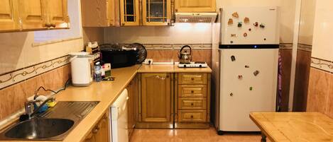 Family Duplex, 4 Bedrooms | Private kitchen | Fridge, oven, electric kettle, highchair