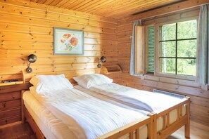Traditional Bungalow, 2 Bedrooms, Partial Lake View | 2 bedrooms, in-room safe, desk, blackout drapes - Hapimag Resort Punkaharju (Savonlinna)