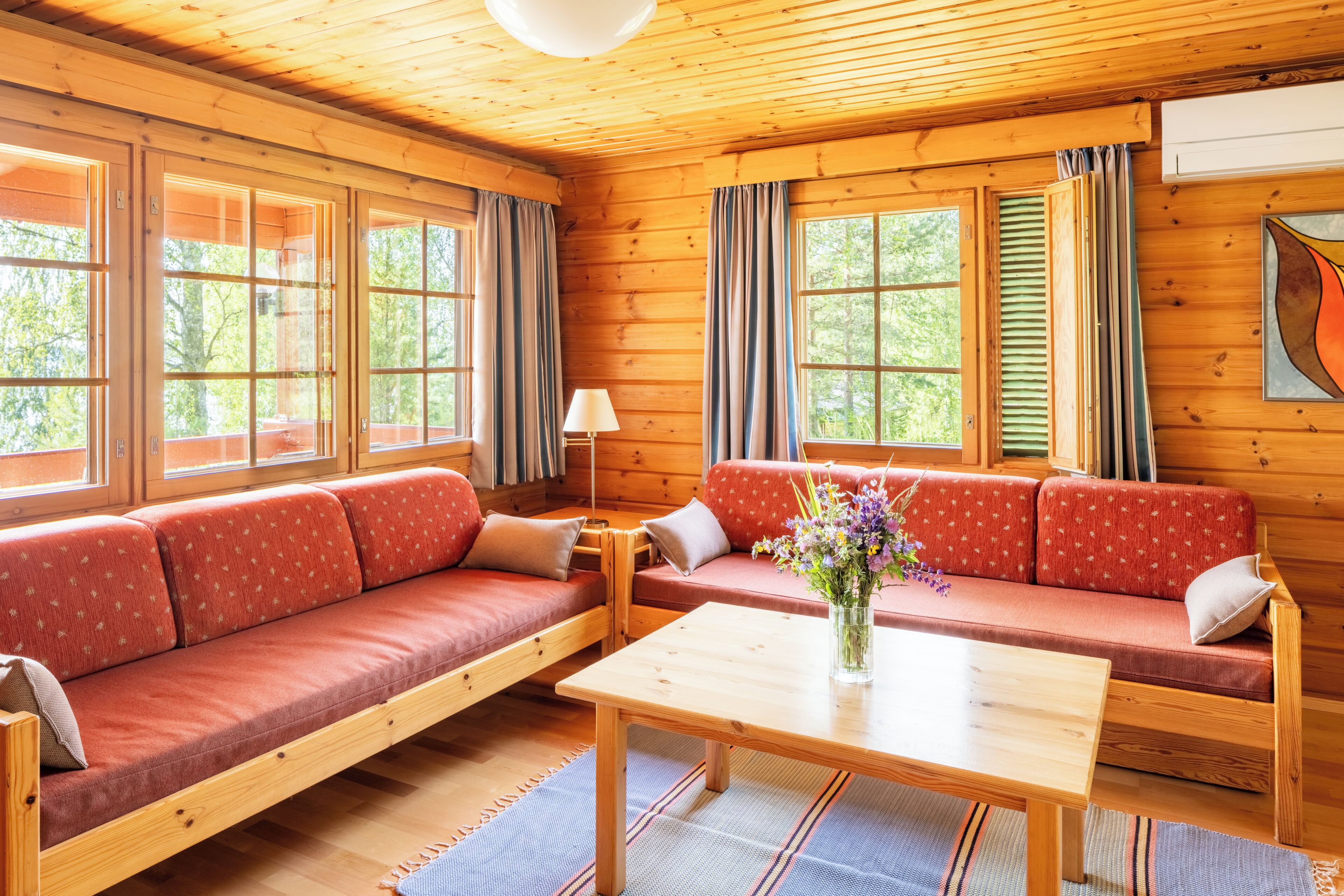 Traditional Bungalow, 2 Bedrooms, Partial Lake View | Living area | 100-cm flat-screen TV with satellite channels, TV, fireplace