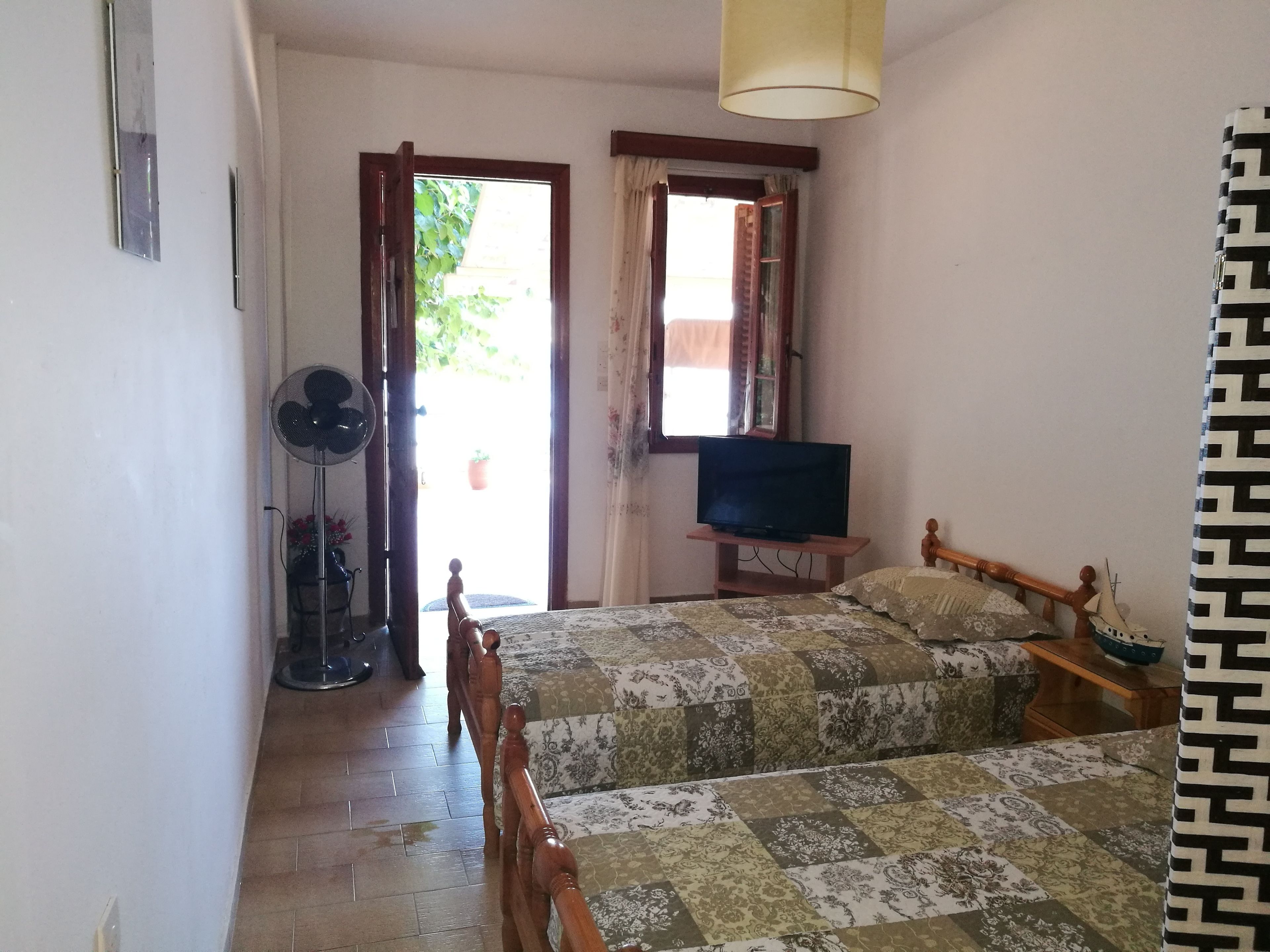 Apartamento, 1 quarto, de frente para a praia | 1 quarto, ferros/tábuas de passar roupa, berços grátis