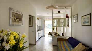 Panoramic Apartment | Living area | Flat-screen TV