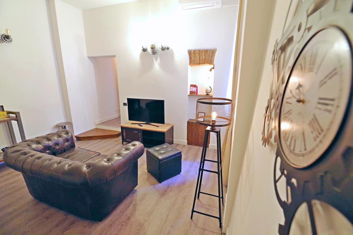 Superior Suite | Living area | Flat-screen TV
