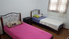 Apartamento, 2 quartos | 2 quartos, cortinas blackout, ferros/tábuas de passar roupa