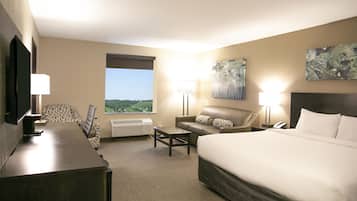 Suíte estúdio premium, 1 cama King e sofá-cama, banheira de hidromassagem | 1 quarto, escrivaninha, quartos à prova de som