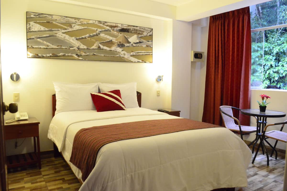 Premium bedding, down duvets, in-room safe, free WiFi
