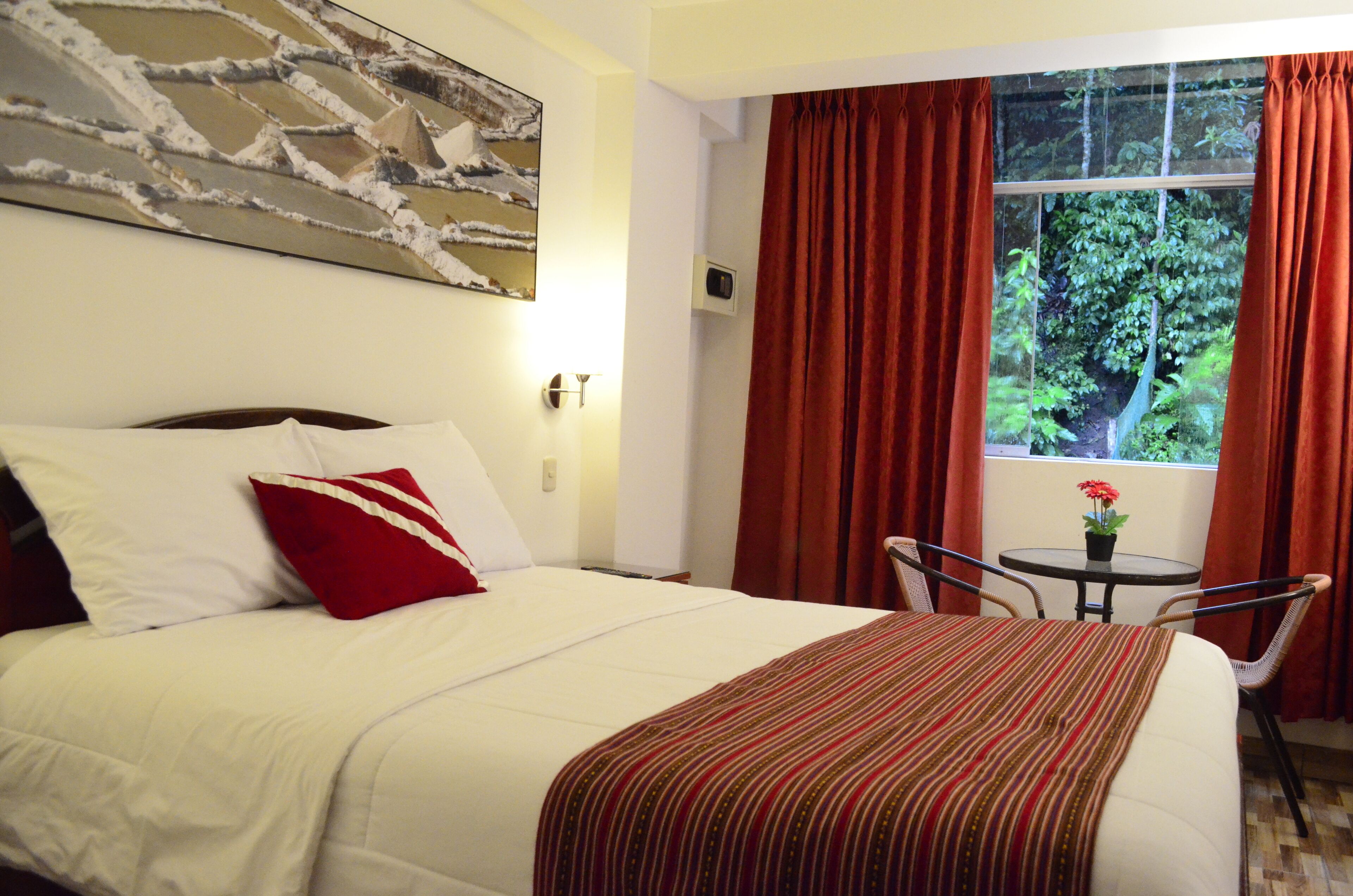 Premium bedding, down comforters, in-room safe, free WiFi