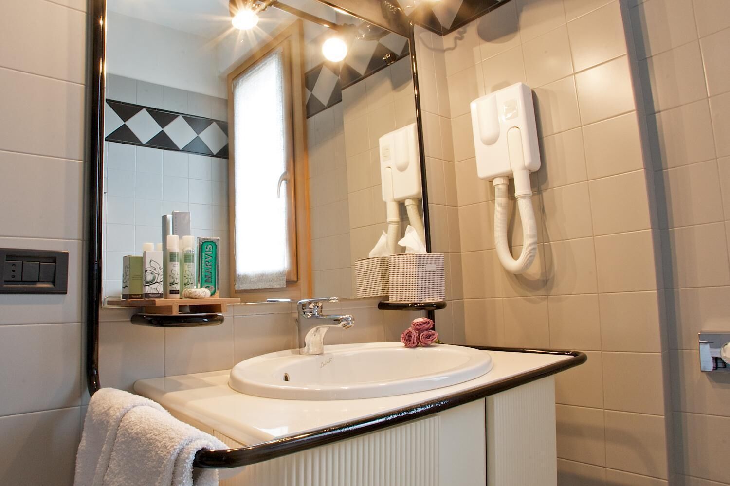 shower, free toiletries, hair dryer, towels