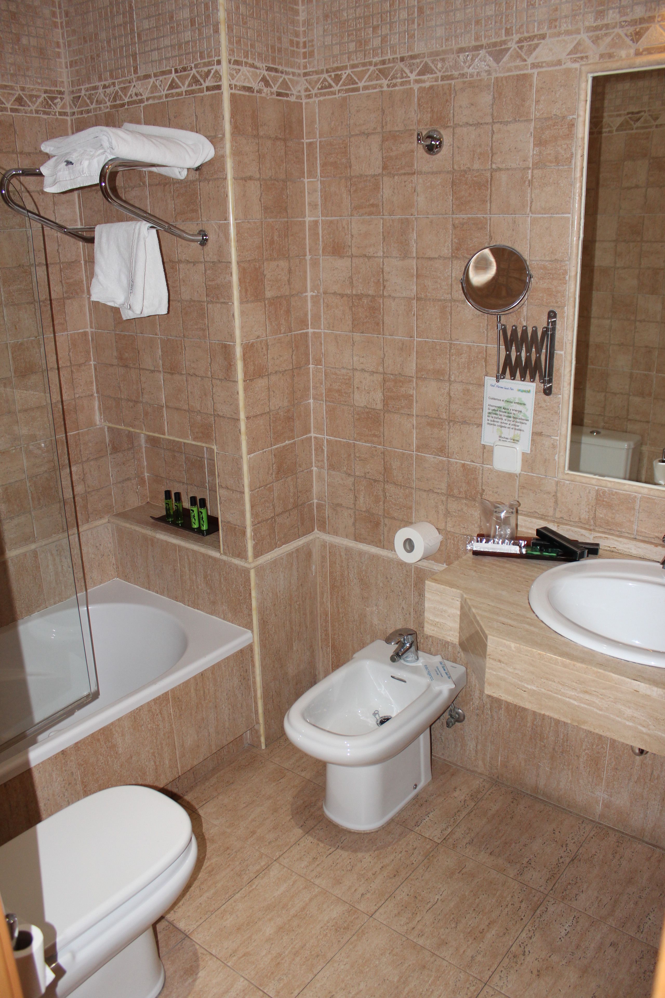 free toiletries, hair dryer, bidet, towels