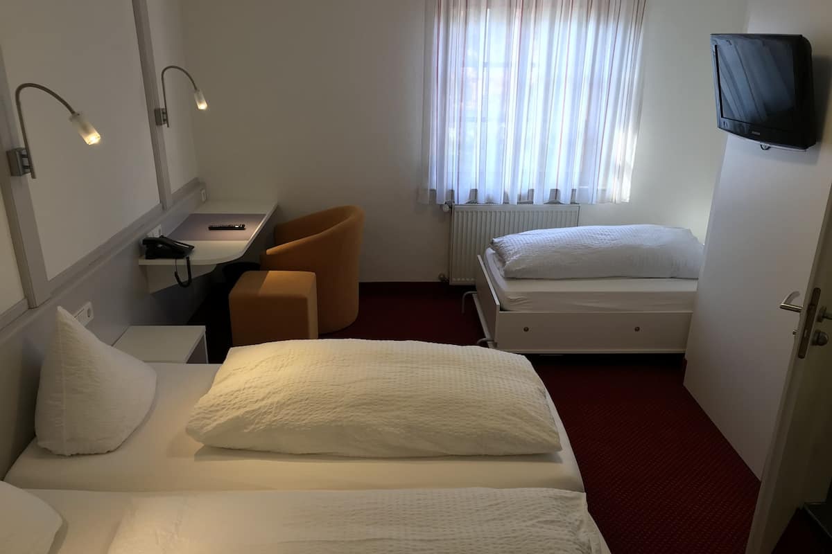 Kamar Triple Comfort, 1 kamar tidur | Seprai premium, meja kerja, kedap suara, dan Wi-Fi gratis