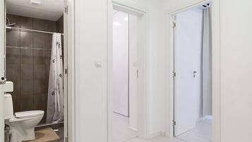 Apartment, 3 Bedrooms | Bathroom | Shower, free toiletries, hair dryer, towels