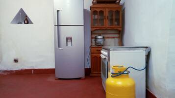 House, 1 Bedroom | Private kitchen | Full-size fridge, coffee/tea maker, cookware/dishes/utensils