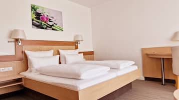 Hypo-allergenic bedding, in-room safe, desk, blackout curtains