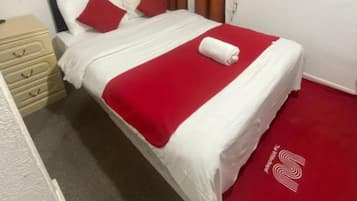 Standard Double Room | Desk, blackout drapes, iron/ironing board, free WiFi