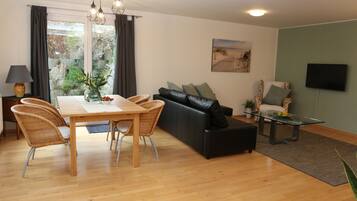 Apartment, 1 Bedroom, Ground Floor (incl. final cleaning fee € 35,-) | Living area | Flat-screen TV