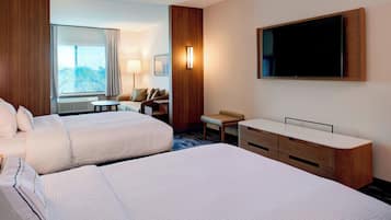 Pillow-top beds, desk, blackout curtains, iron/ironing board