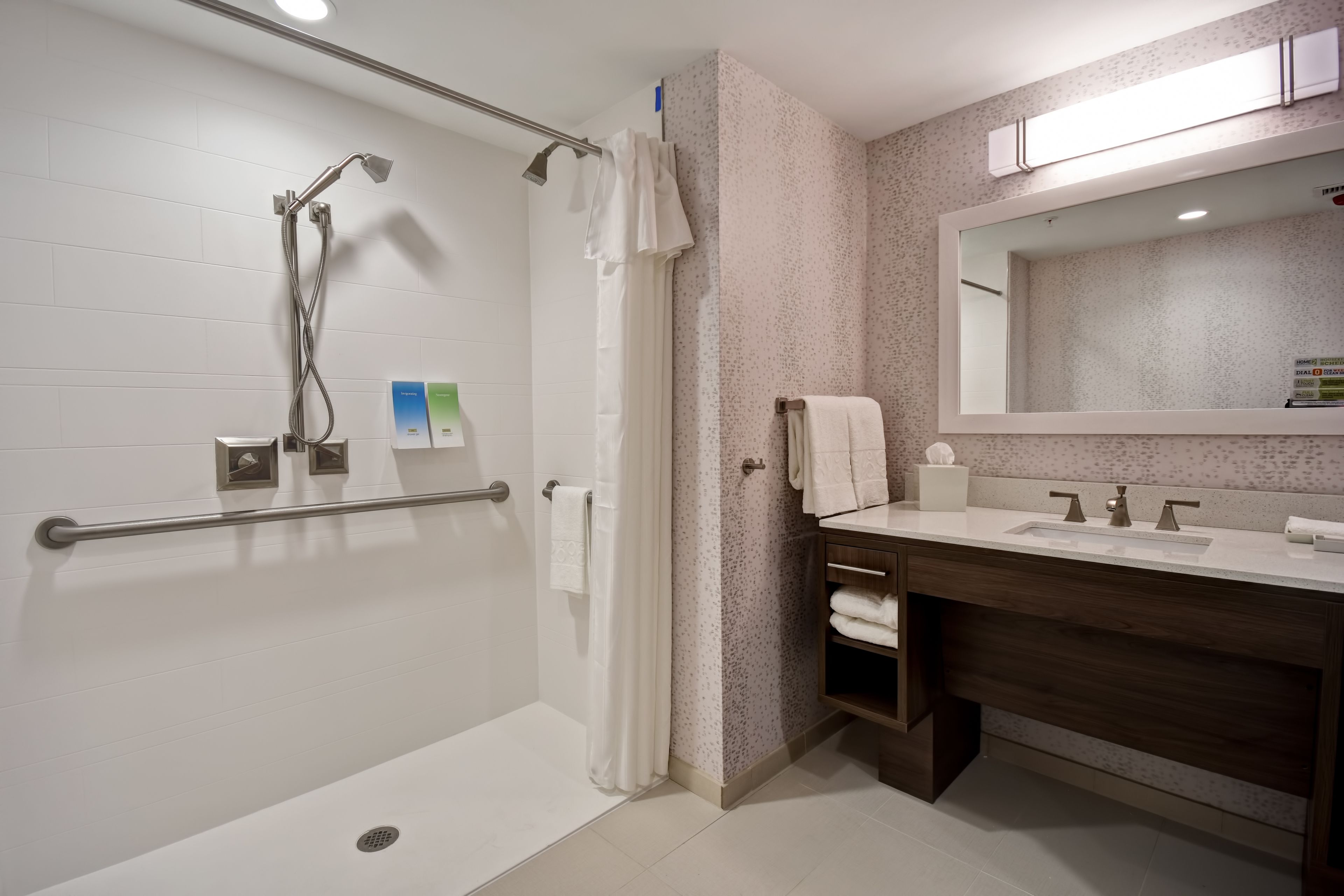 studio, 1 king bed, accessible (mobility & hearing, roll-in shower) | bathroom | shower, free toiletries, hair dryer, towels
