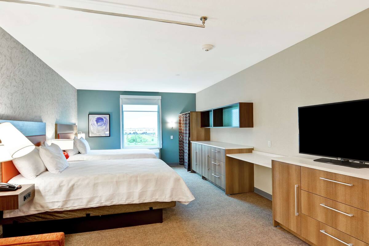 premium bedding, down duvets, desk, laptop workspace