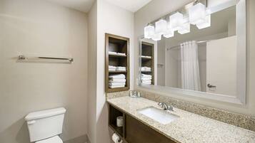 Premium bedding, desk, laptop workspace, blackout curtains