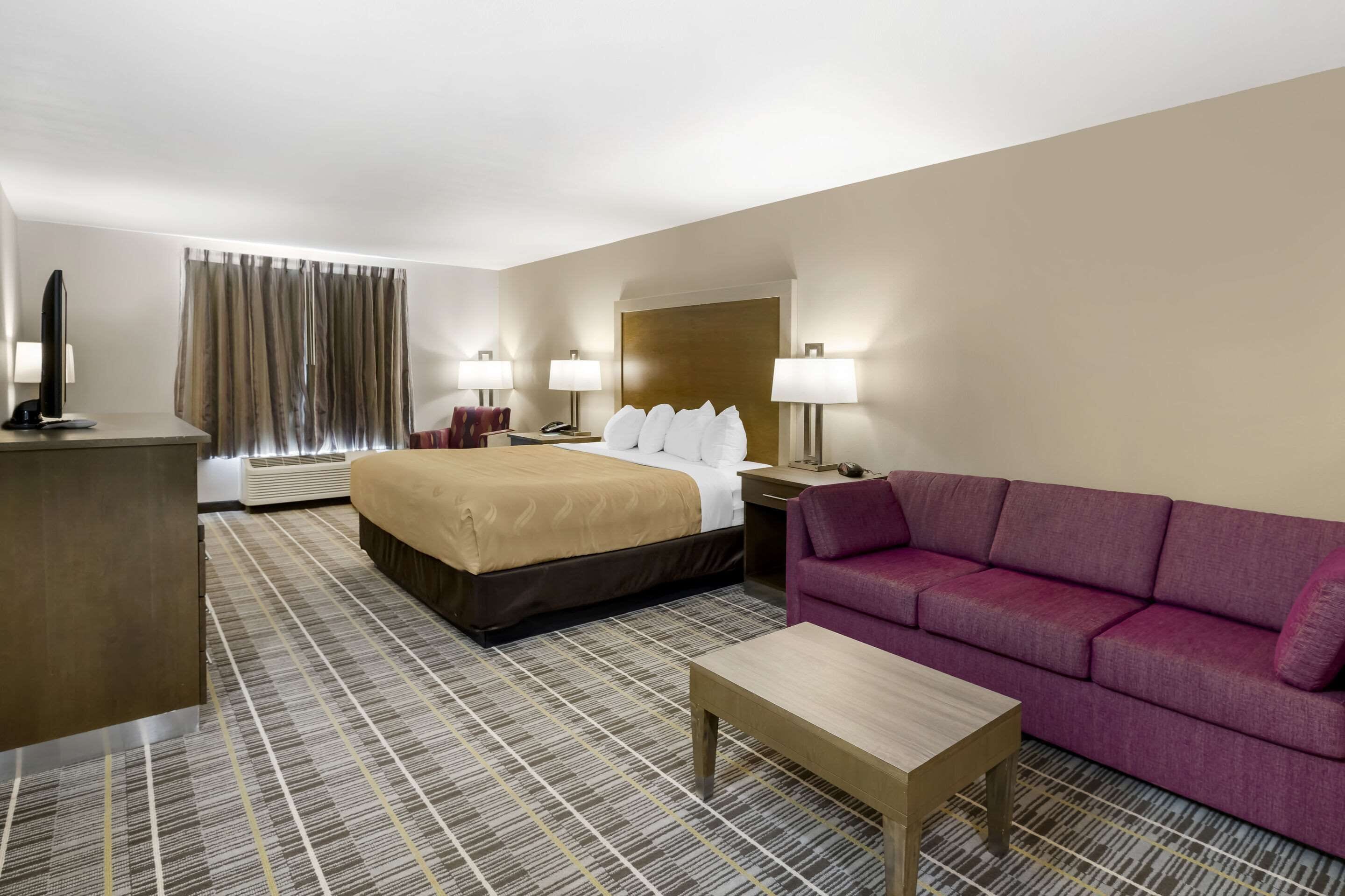 premium bedding, desk, laptop workspace, blackout curtains