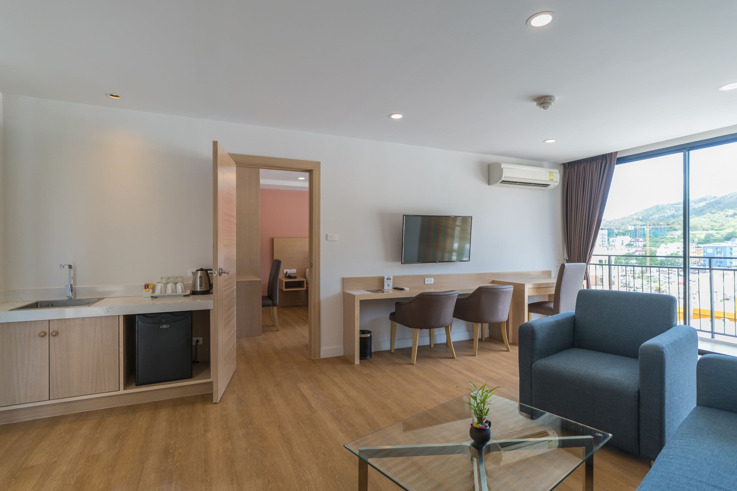 family room | in-room safe, desk, blackout curtains, soundproofing