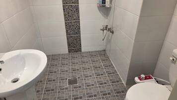 Standard Double Room | Bathroom | Shower, free toiletries, hair dryer, bathrobes