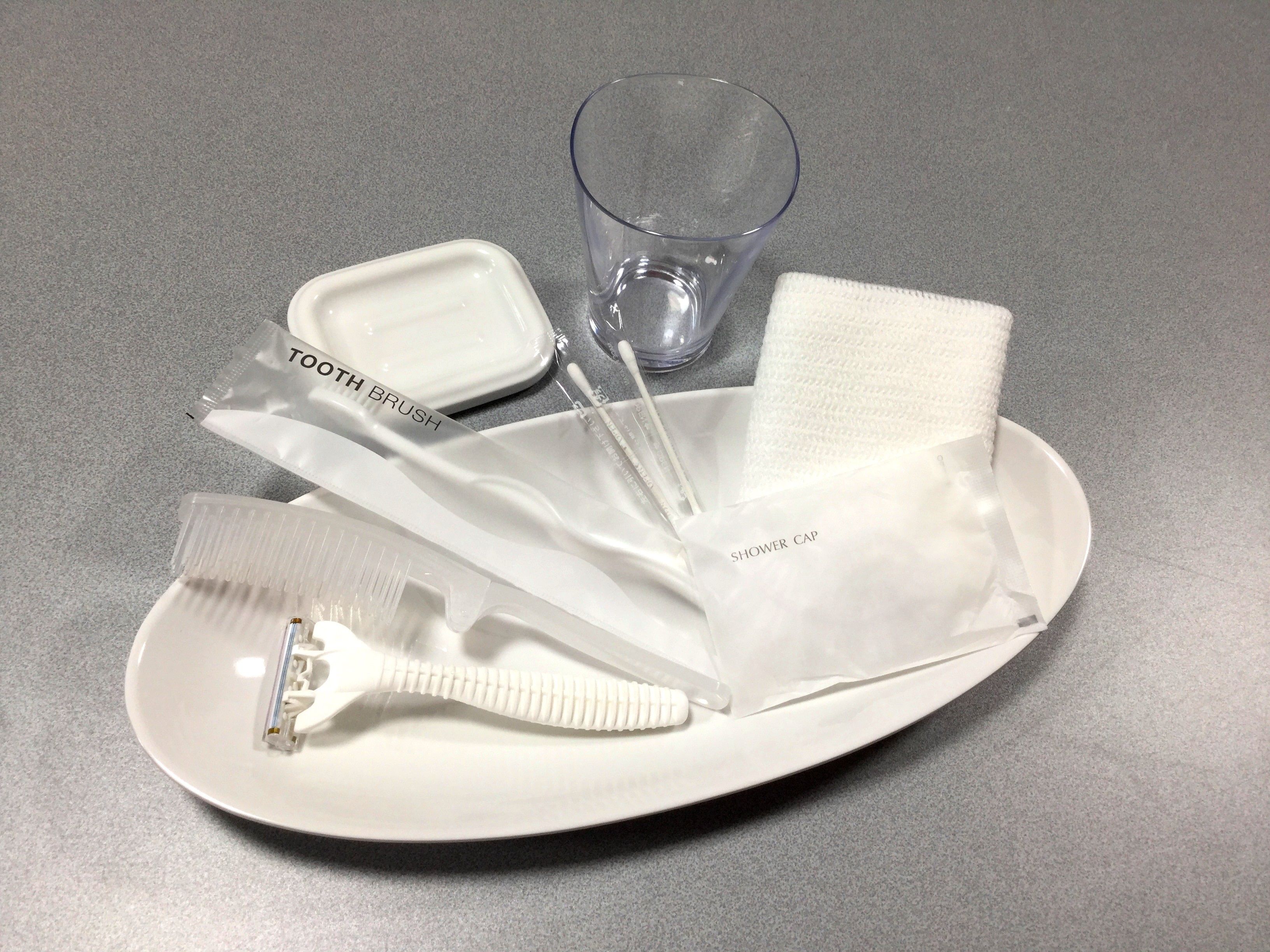 combined shower/bathtub, free toiletries, hair dryer, slippers