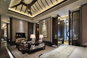 Suite Premier | Roba de llit d'alta qualitat, minibar i caixa forta a l'habitació 
