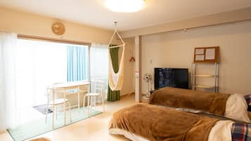 Chambre Deluxe, animaux de compagnie acceptés | Espace de travail pour ordinateur portable, Wi-Fi gratuit, draps fournis