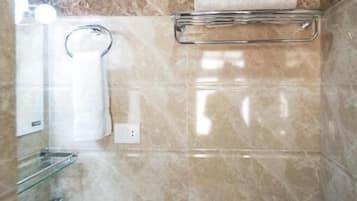 Shower, free toiletries, slippers, towels