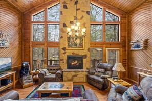 Télévision, cheminée, baby-foot