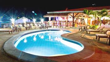 Outdoor pool, open 7:00 AM to 11:00 PM, pool umbrellas, sun loungers