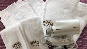 Separate bathtub and shower, free toiletries, hair dryer, slippers
