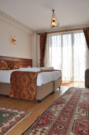 In-room safe, desk, blackout curtains, iron/ironing board