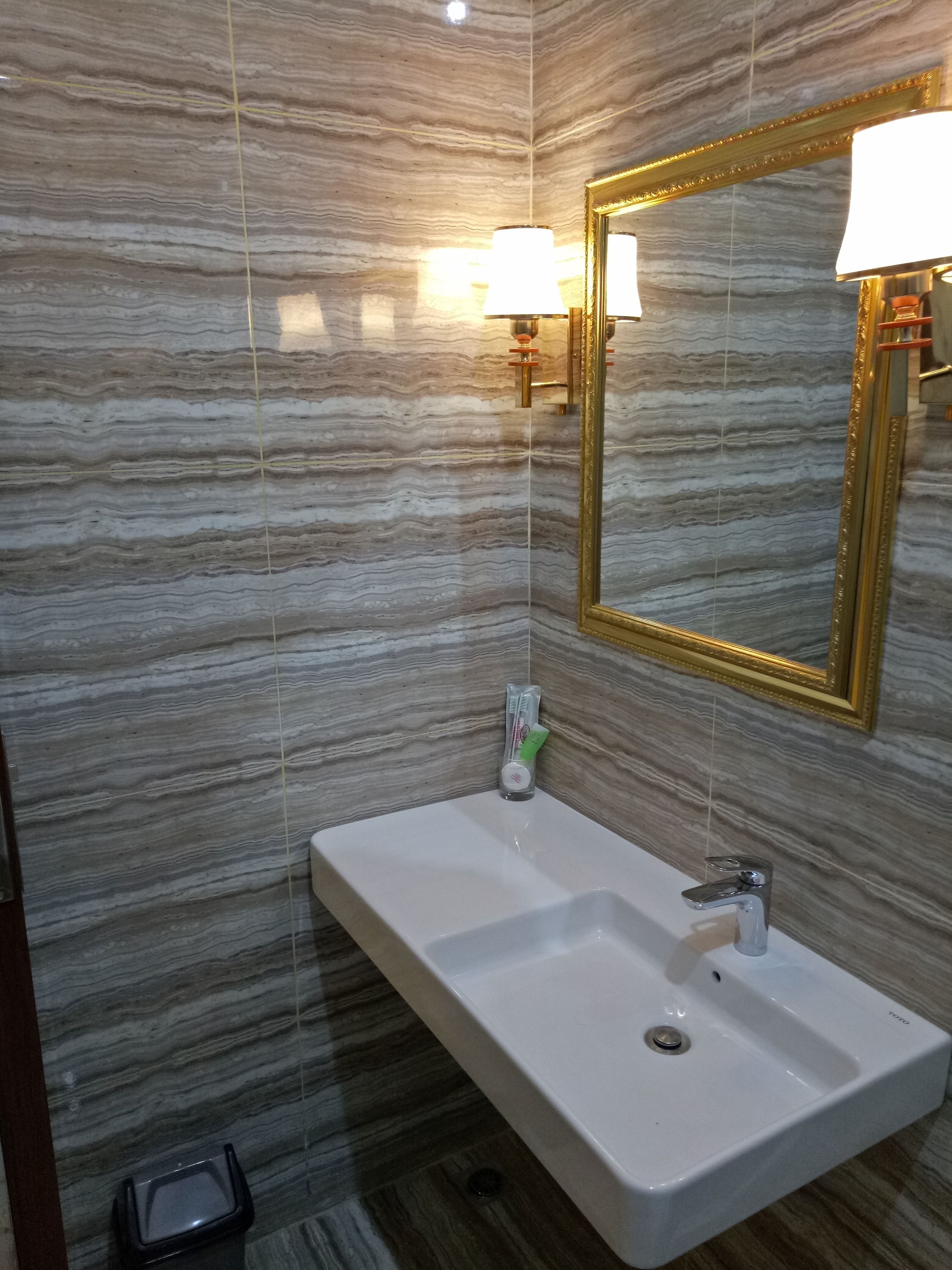 shower, free toiletries, slippers, towels