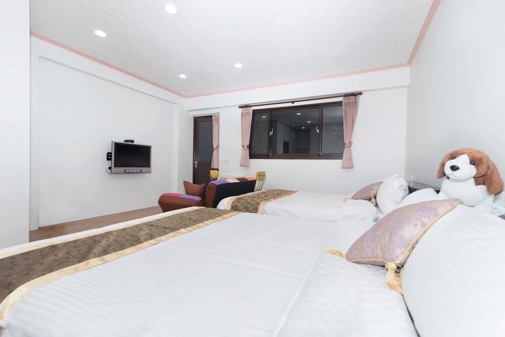 Chambre Quadruple Standard, 2 lits doubles | Bureau, rideaux occultants, chambres insonorisées