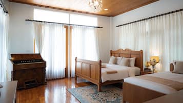 Grand Pool Suite | Minibar, in-room safe, individually furnished, desk