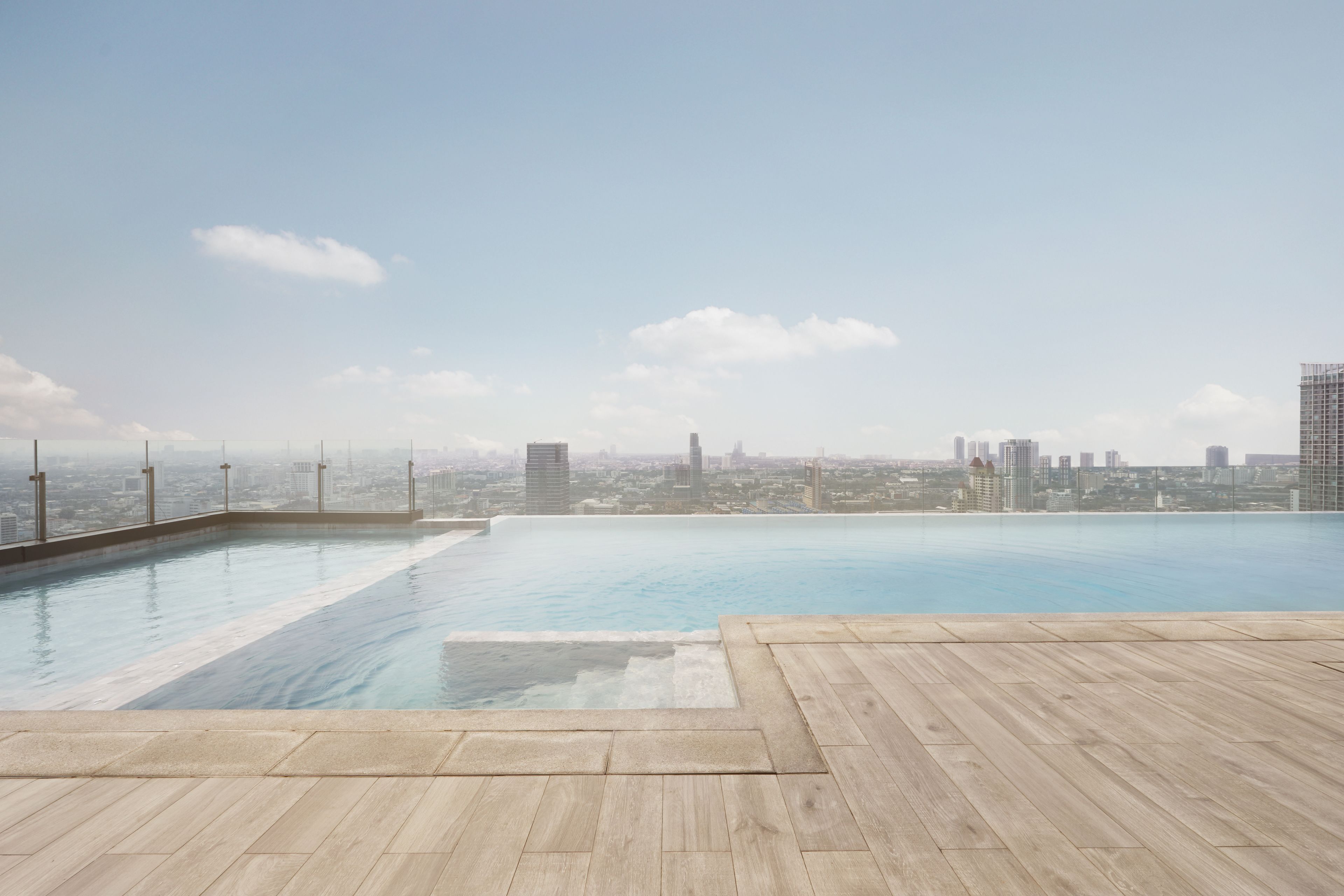 outdoor pool, open 6 am to 10 pm, pool loungers